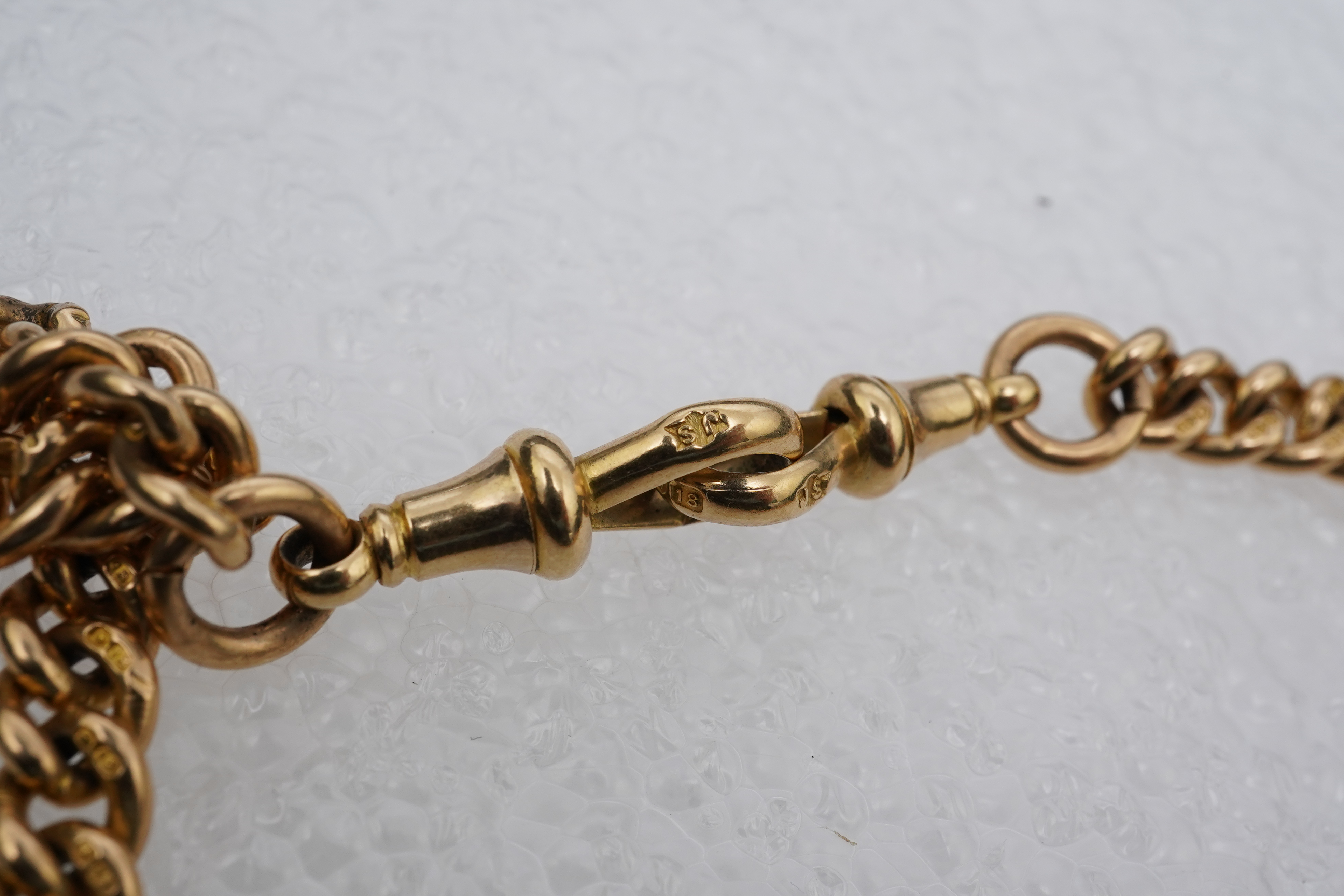 A Victorian 18ct gold watch chain, circa 1886